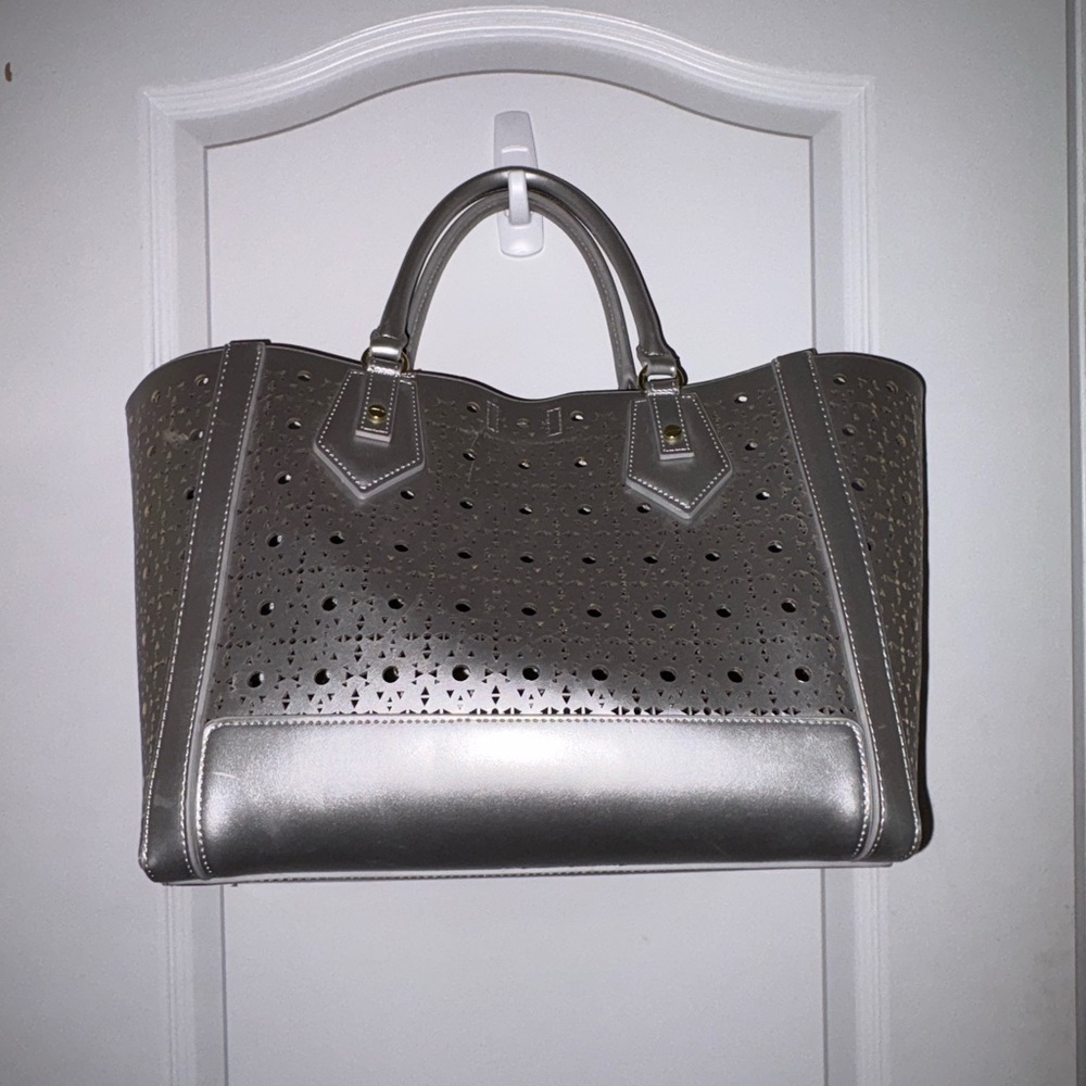 Steve Madden Silver Perforated Tote with Tassel - Picture 2 of 6